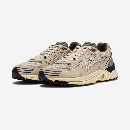 Autry Hyperway CI05 vue de profil, beige sable, gris et bleu marine